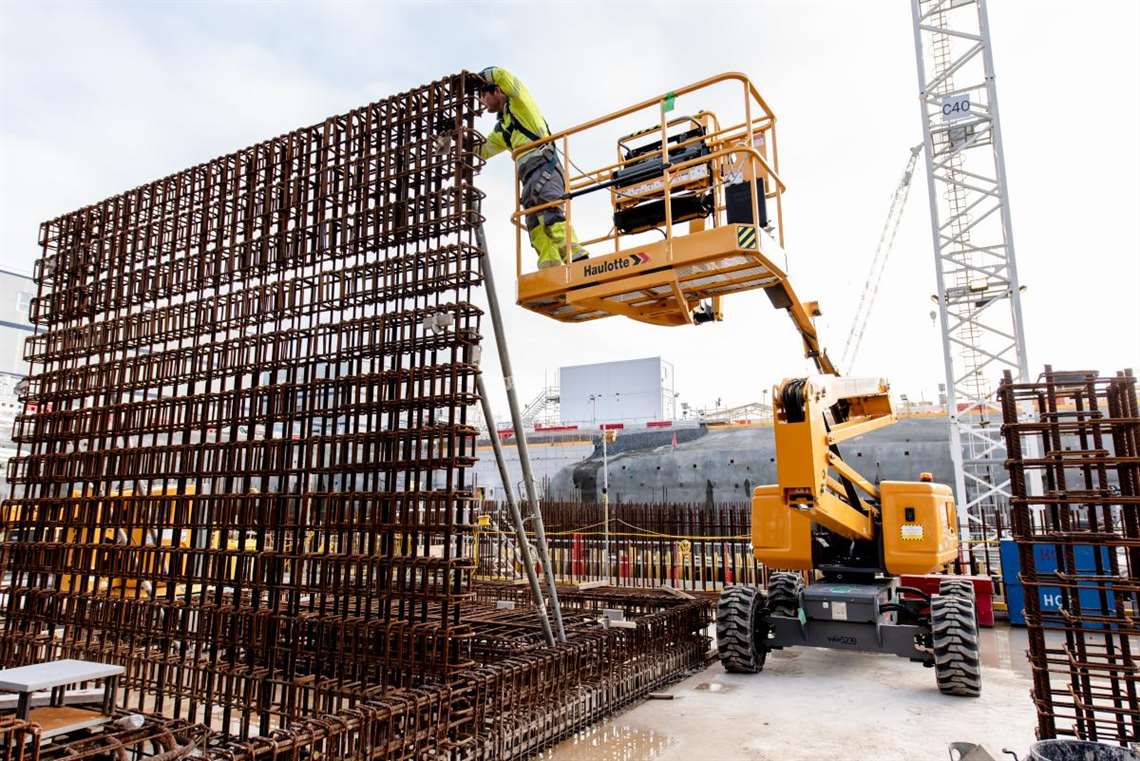 An electric articulated boom in use at Hinkley Point C