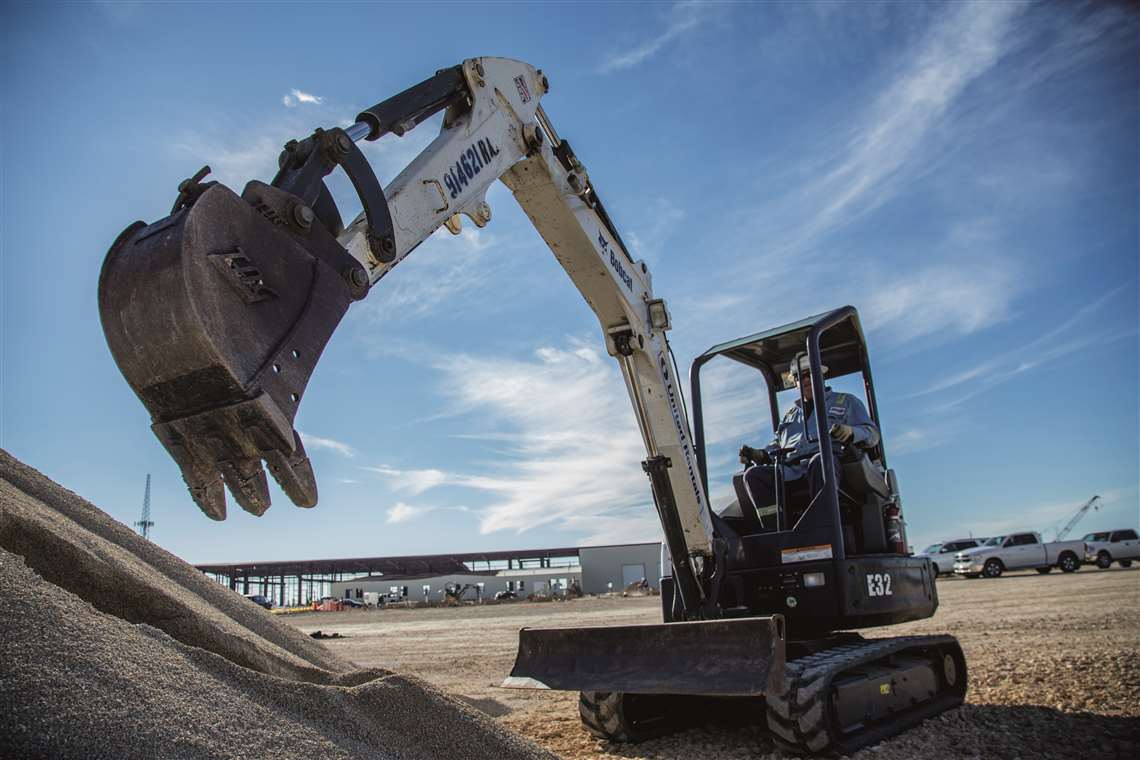 An excavator from United Rentals