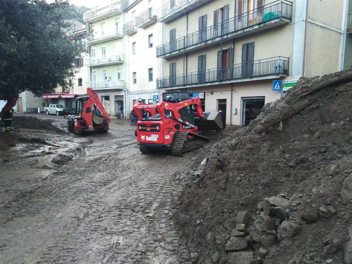 The Bobcat T870 loader at work on a disaster site