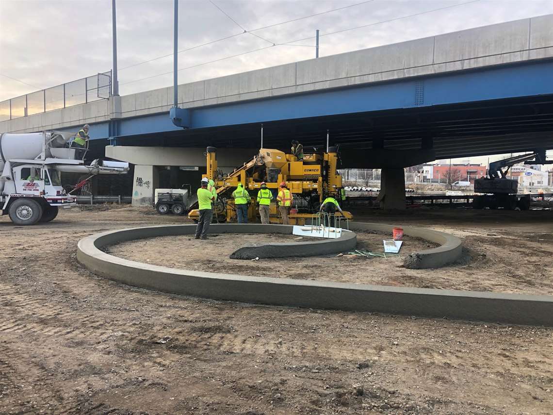 Topcon's robotic survey equipment in use on a road intersection project