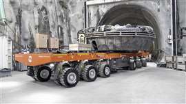 Scheuerle PowerHoss emerging from a tunnel carrying a section of tunnel boring machine