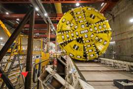 A yellow TBM cutter head underground for use on the Metro Tunnel Project in Australia.