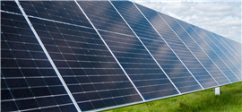 A solar panel on grass