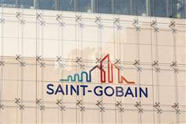 A Saint-Gobain logo on the side of a building.