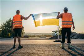 Ukraine road workers Image: Adobe Stock)