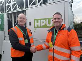 Photo of Andy Doherty of Sunbelt Rentals UK shaking hands with Matt Docherty of GeoPura, at a recent Sunbelt customers event in the UK. (Image: IRN)