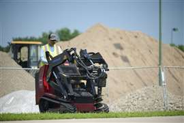 The Dingo TX-1000 Turbo working with an auger attachment