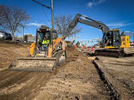 A Case skid steer loader operating with Trimble's Siteworks positioning system