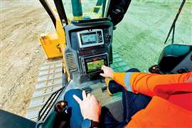 An operator using Trimble Earthworks