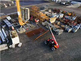 A construction telehandler's versatility and maneuverability allow it to transport materials quickly and efficiently across a jobsite