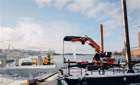 Wilgo's Jekko JF545 articulated crawler crane on the scow.