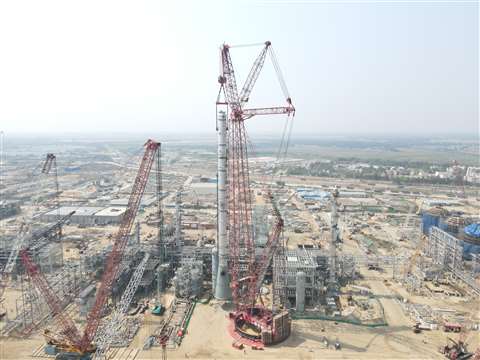 Red Mammoet PT50 ring crane in the heart of the Paradip Refinery