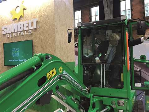 UK Prime Minister Boris Johnson in a Sunbelt machine