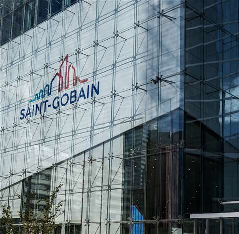 The Saint-Gobain logo on the side of a building