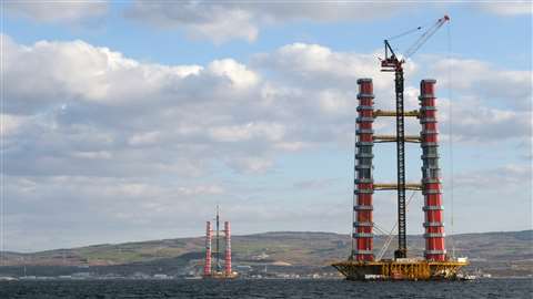 big luffing tower crane on a bridge pylon