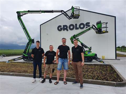 The Grolos team outside its headquarters in Slovakia with a new Leguan spider lift