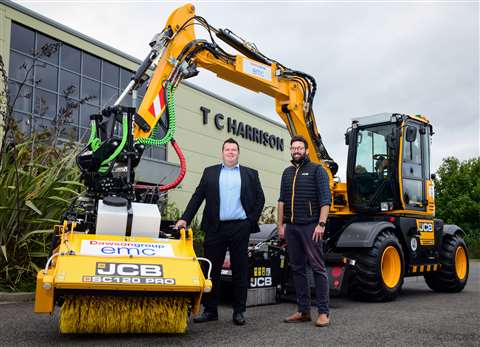 Dawsongroup's Managing Director Glen Carruthers (left) and Oli Brown of dealer TC Harrison JCB.