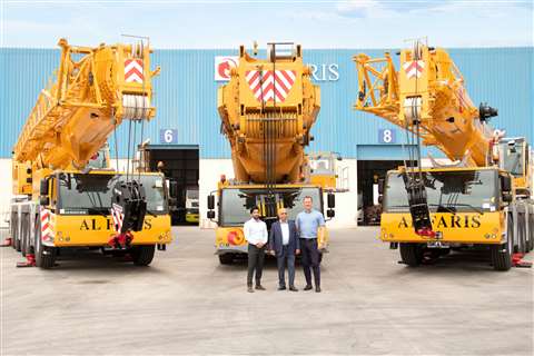 trio of yellow liebherr cranes