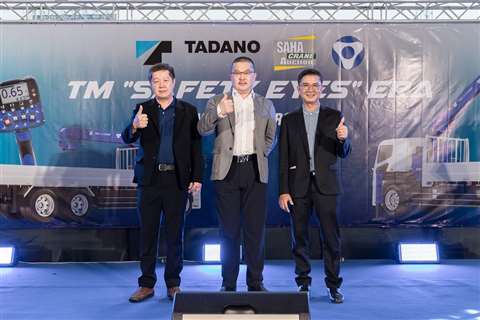 three people side by side celebrating crane deal