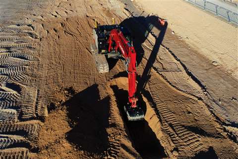 An excavator using technology to help its operator 