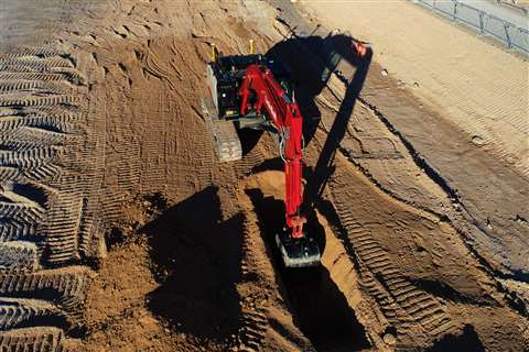 An excavator using technology to help its operator