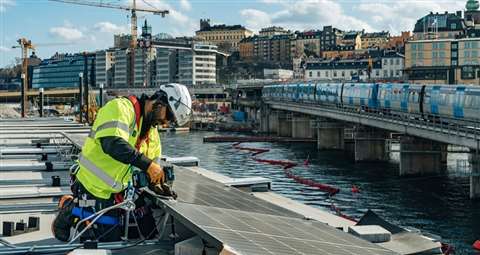 Skanska is testing a new solution with solar cells on construction sheds as part of a 140m steel bridge it is building in the centre of Stockholm