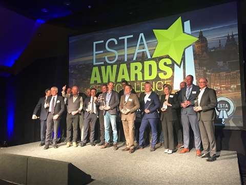 group of ESTA Award winning people lined up on stage
