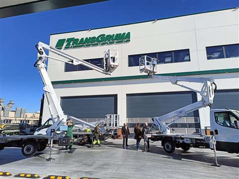 Two of Transgruma's new HX200 Ex truck mounts at its base in Madrid, Spain.