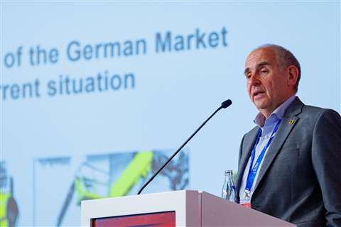 Jürgen Küspert, managing director of bbi, speaking at the 2023 IPAF Summit in Berlin. (Photo: Joe Mather/IPAF)
