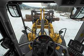 Looking out from inside the Cat 938M small wheeled loader cab