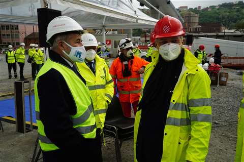 Genoa Mayor Marco Bussi (white hat) with Salini Impregilo Chief Executive Pietro Salini (red hat)