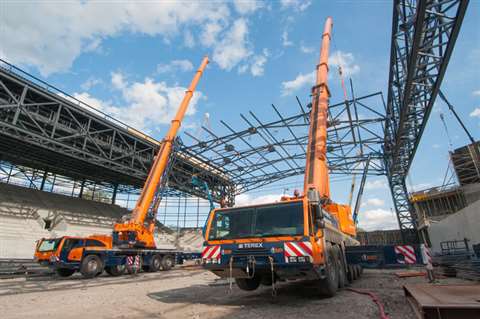 A Terex Explorer 5800 and an AC 250-1 all terrain crane work in tandem at a new multi-purpose arena 