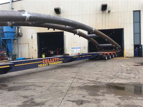 The footbridge arch exits the fabrication shop