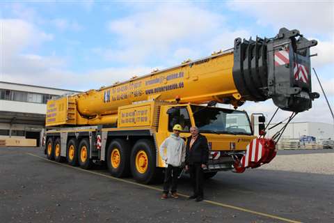 Delivery of the ATF 400G-6 to I&amp;H Kran Transport Montage Service. From left to right: Nils Lauma