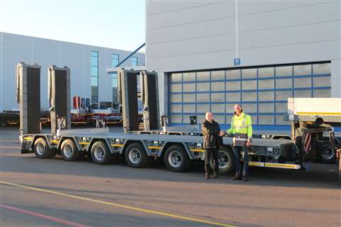 Günther Vogel, Goldhofer area sales manager, Handing over two new MPA 6 low loaders to Stéphane Friderici. Photo: Goldhofer
