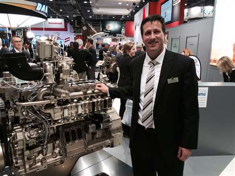Geoff Stigler, of John Deere, with the company's latest series of engines released at Intermat, Pari