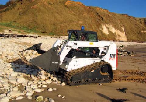 One of the first of Bobcat's new T250 compact tracked loaders is clearing rocks in front of the Roya