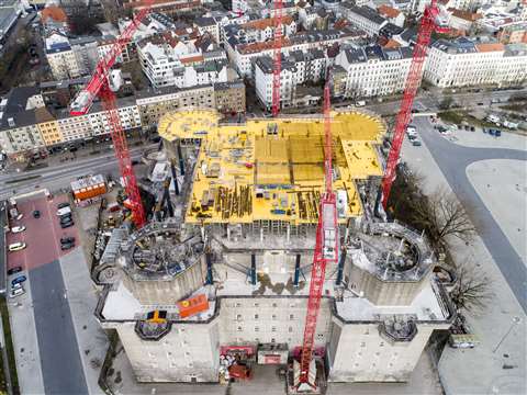 Looking down on the top of the bunker with the four red Wolff tower cranes around it