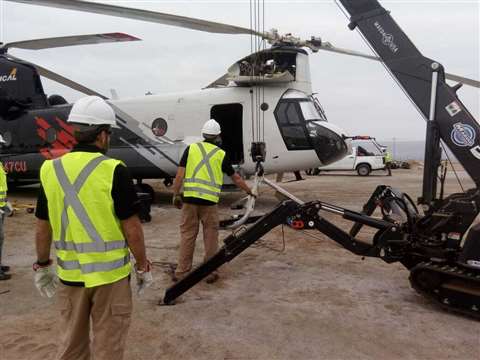 Maeda at work on helicopter repair