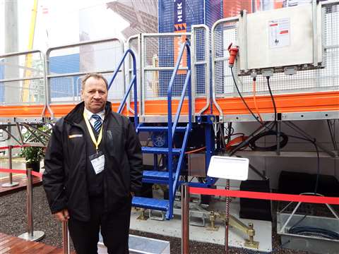 Tormod Gunleiksrud, CEO and president of Alimak Hek in front of the SC 45/30.
