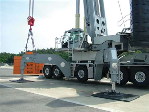 Tadano ATF 600G-8 Triple Boom with X-pattern outriggers lifting a test load in Germany June 2015