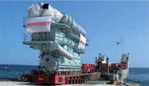Emmert International had the job of installing a fully assembled and operational low-speed diesel en