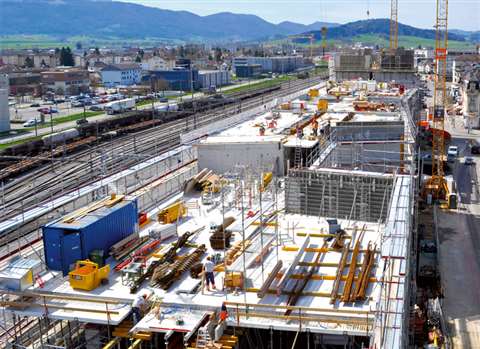 A Delémont, Switzerland, university project comprises four offset blocks with four levels each, and 