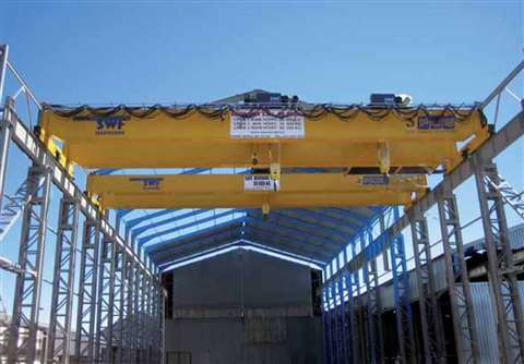 New double girder bridge cranes with SWF Nova electric wire rope hoists. The crane in the foreground