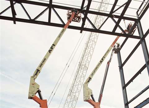 Two of the AFI boom lifts in action at the Exhibition Centre Liverpool.