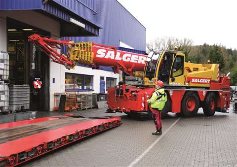 Machinery installation is an area where radio remote control can be a big help in safely manoeuvring a large wheeled mobile crane inside a building