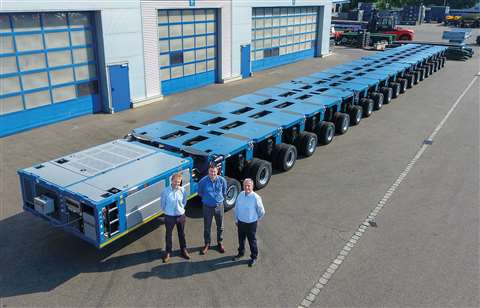 Jan and Carl Sarens with Horst Häfele, head of product management at Goldhofer, outside the plant in Memmingen
