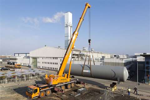 Sommer using a Liebherr LTM 1300-6.2 mobile crane to install a hot water tank at the Airbus Plant in