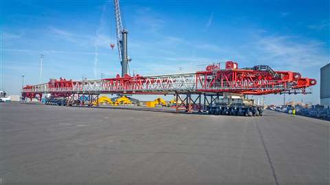 Cometto MSPE 48t transporter carrying a 105 m long crane boom