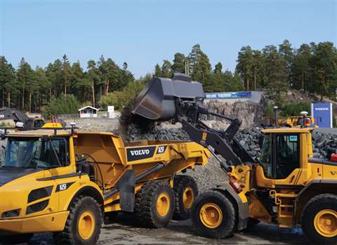 Volvo's prototype autonomous wheeled loader and articulated dump trucker working together